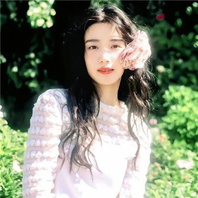 桃花含露又春风
